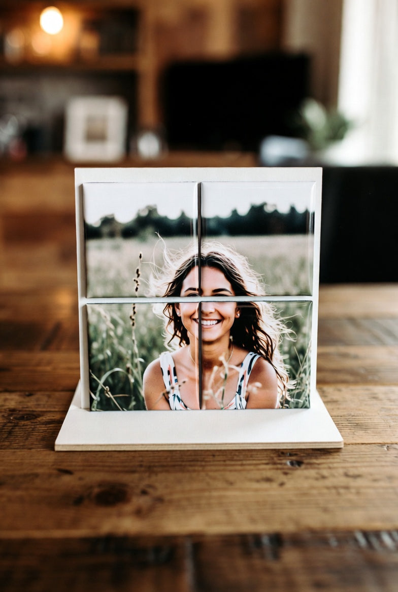 Four-panel Custom Puzzle Magnet Set 2x2 on a wooden surface with a blurred background