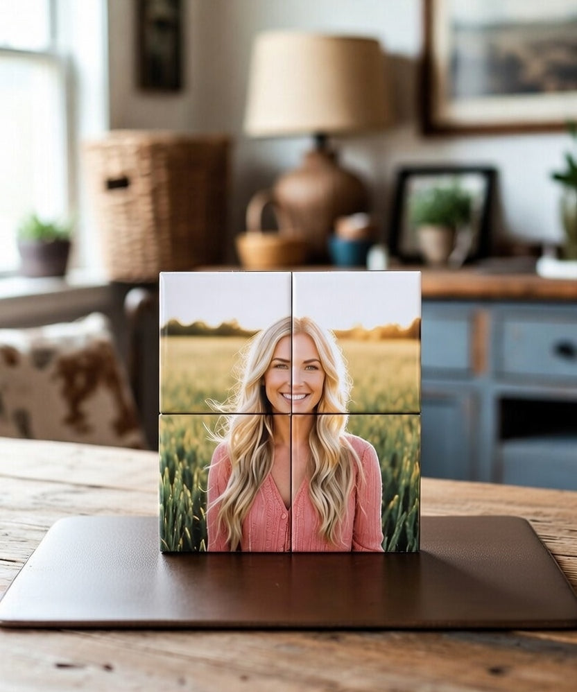 Four-panel magnet custom puzzle set mosaic of a woman in a field on a wooden surface.